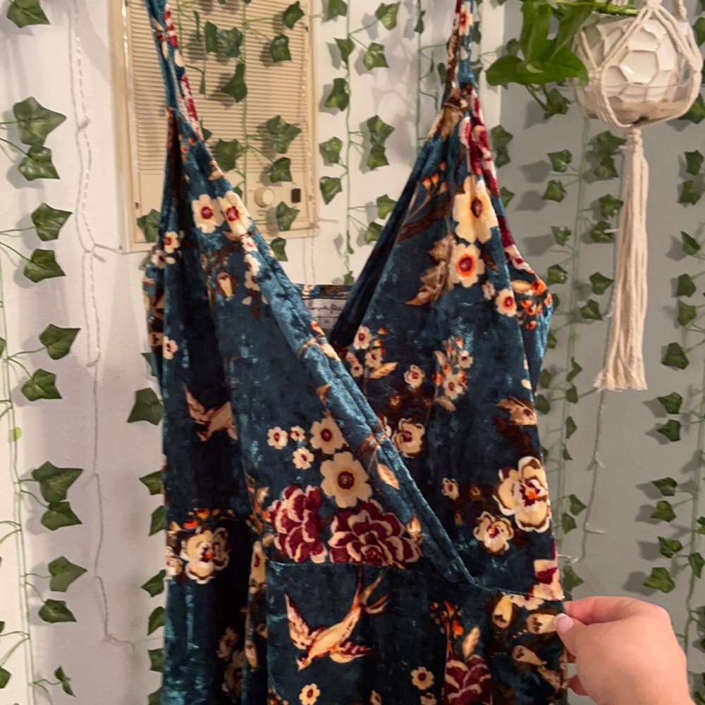 Velvet green dress with floral designs